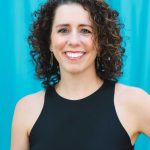 Gibson pictured on against a teal background.