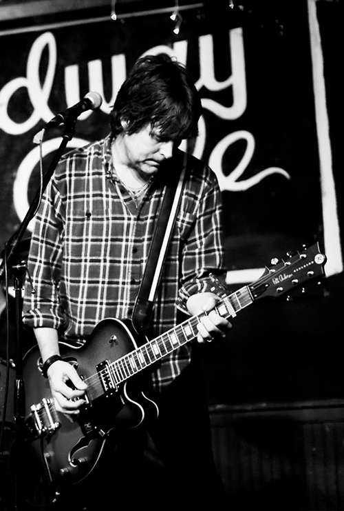 Porter pictured playing guitar